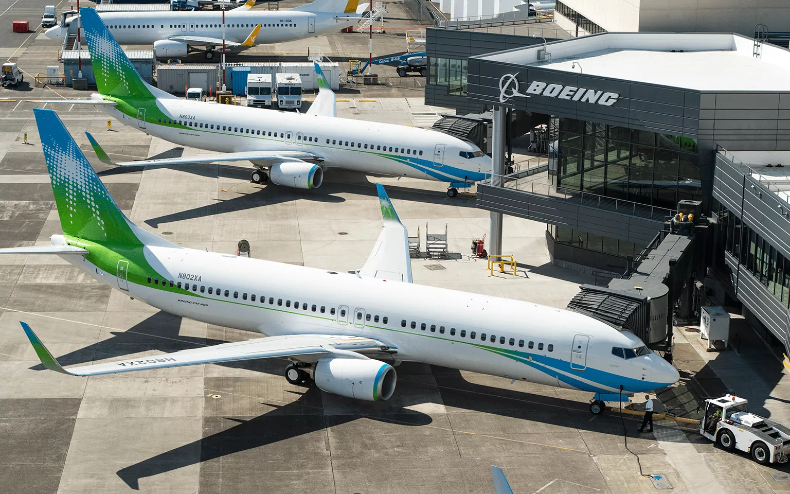 Saudi Aramco planes stocked at the gate of the airport preparing for takeoff